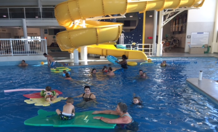 family in pool